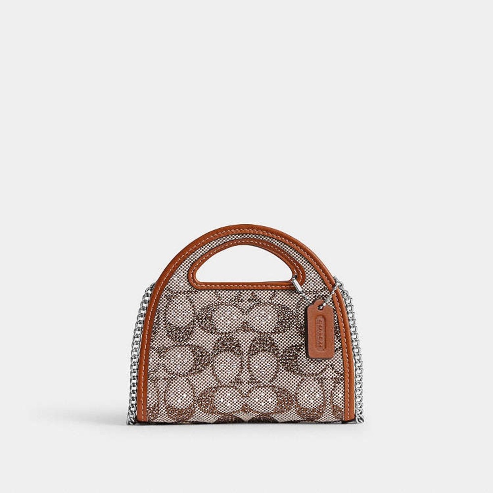 Top Handle Card Case
In Crystal Signature Jacquard NWT
Coach - Picture 3 of 5